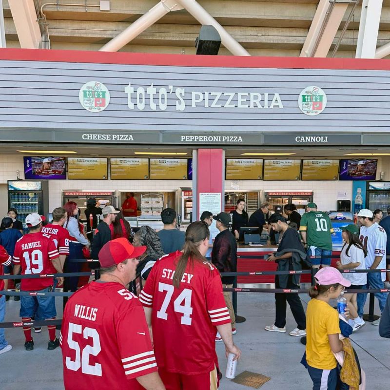 crowd in line at Toto's Pizzeria concessions stand 315 at Levi's Stadium in San Jose, California